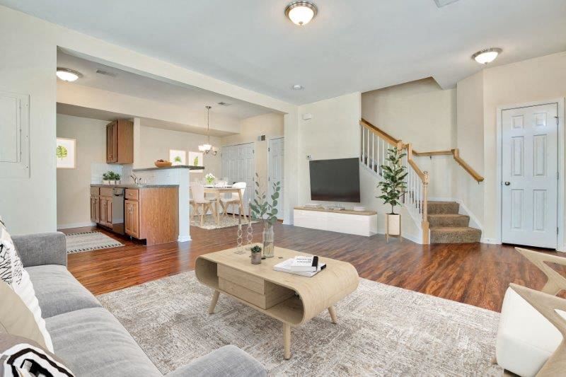 a living room with a couch and a table