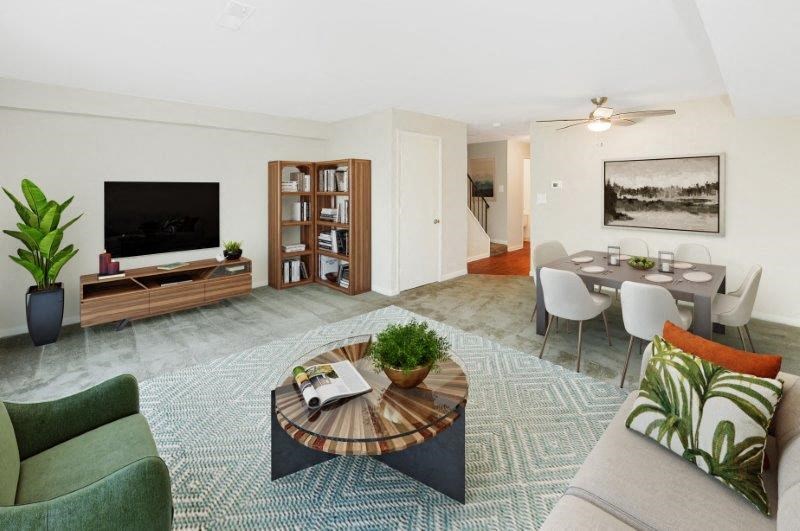 a living room with a couch and a table