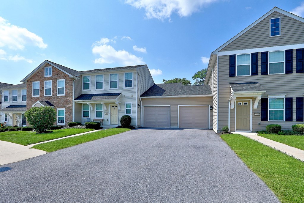a house with a driveway in front of it