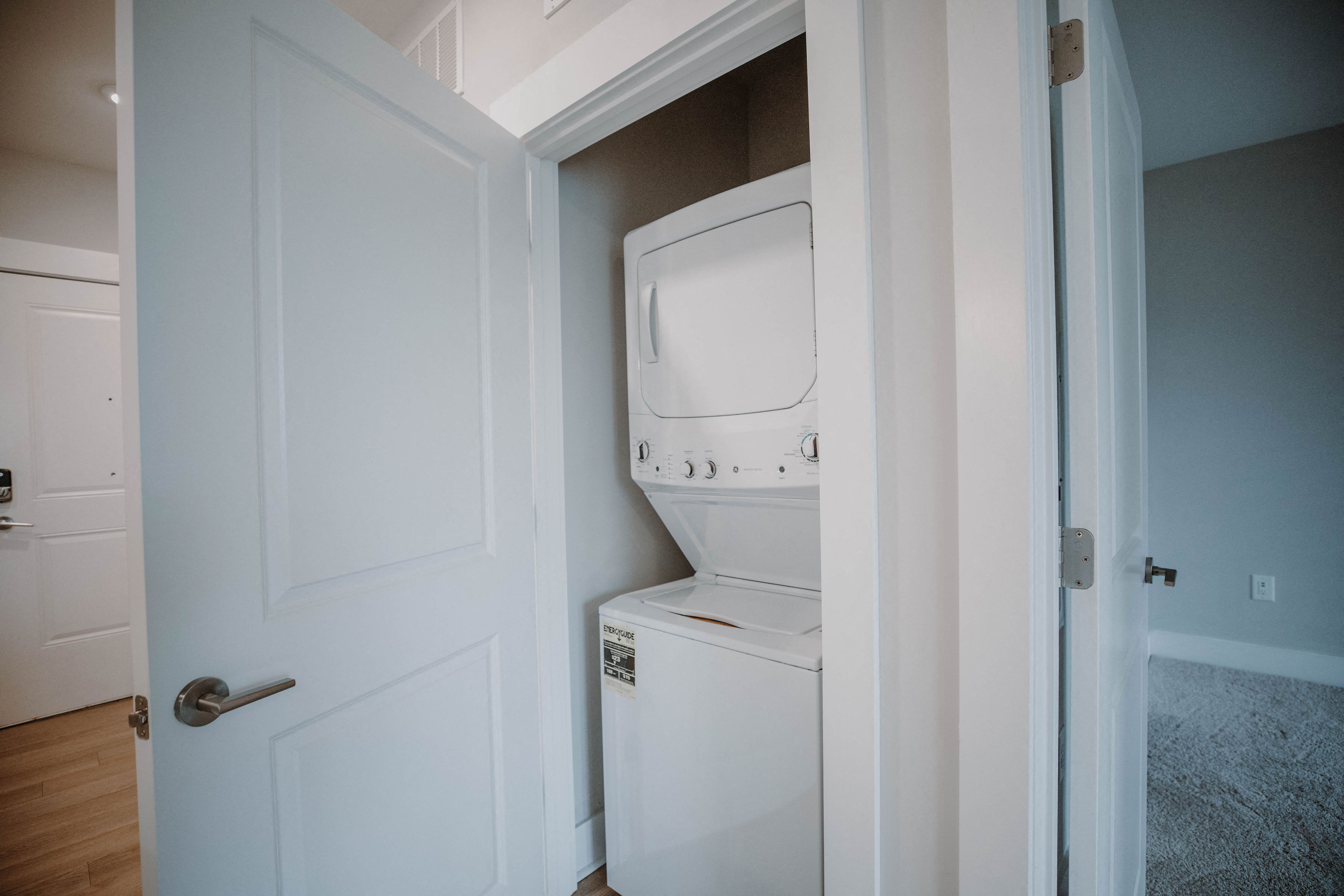 a small laundry room with a washer and dryer in it