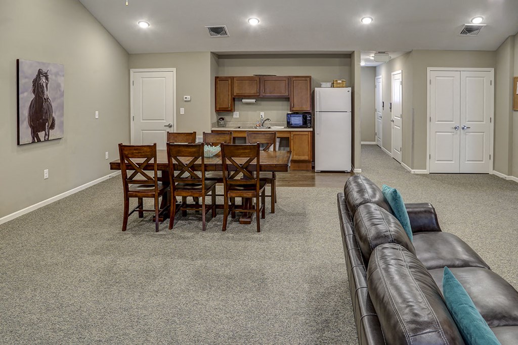 a living room with a table and a couch