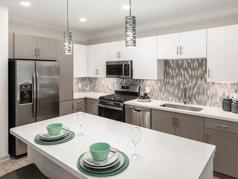 Model kitchen with white cabinets at Norte Town Lake Apartments in Tempe Arizona