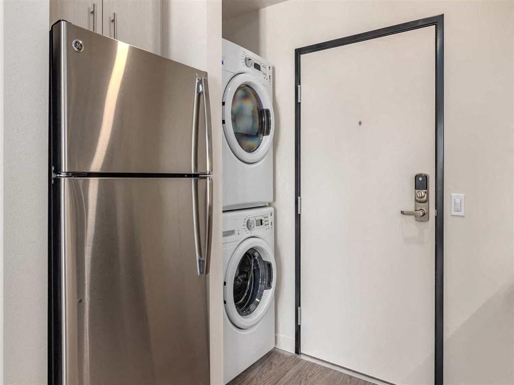 In unit washer and dryer at Acqua Apartments.