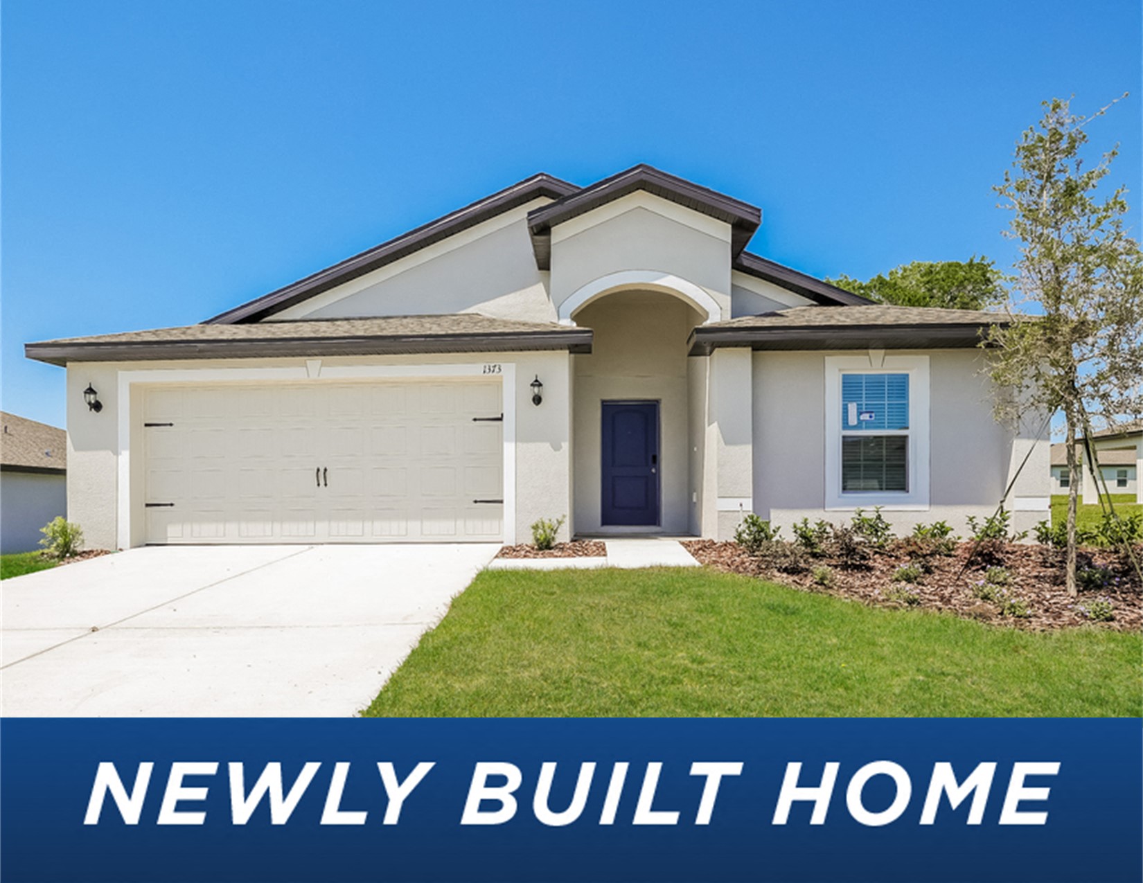 a house with the words newly built home in front of it