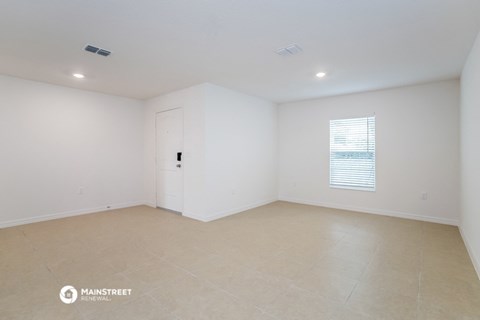 the living room is clean and ready for us to use