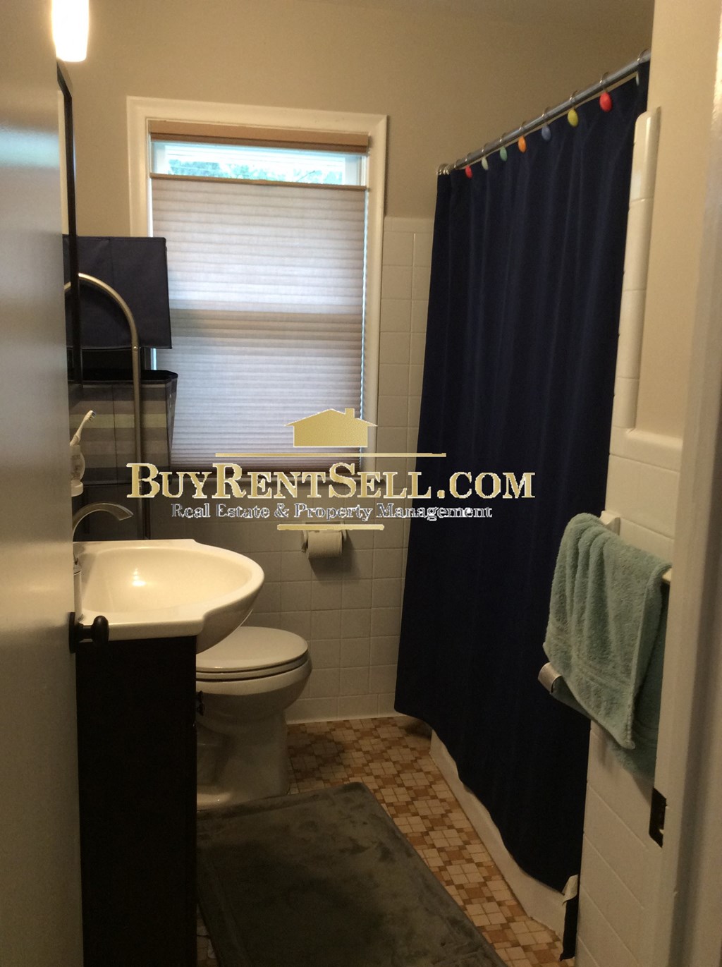 a small bathroom with a toilet and a sink