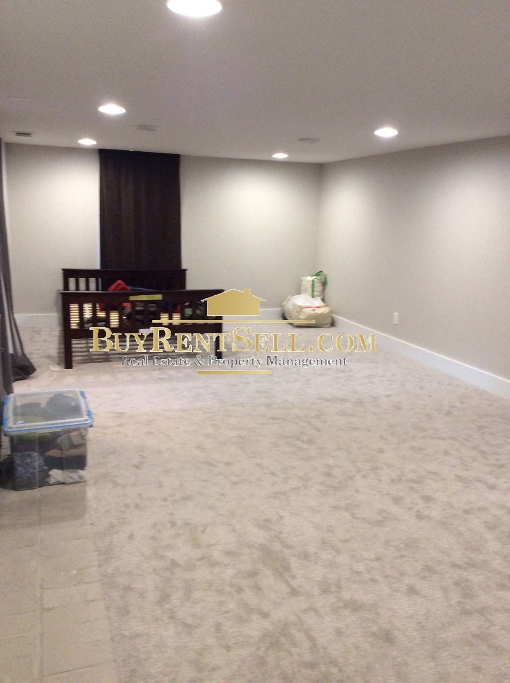 a living room with a couch and a table in a room