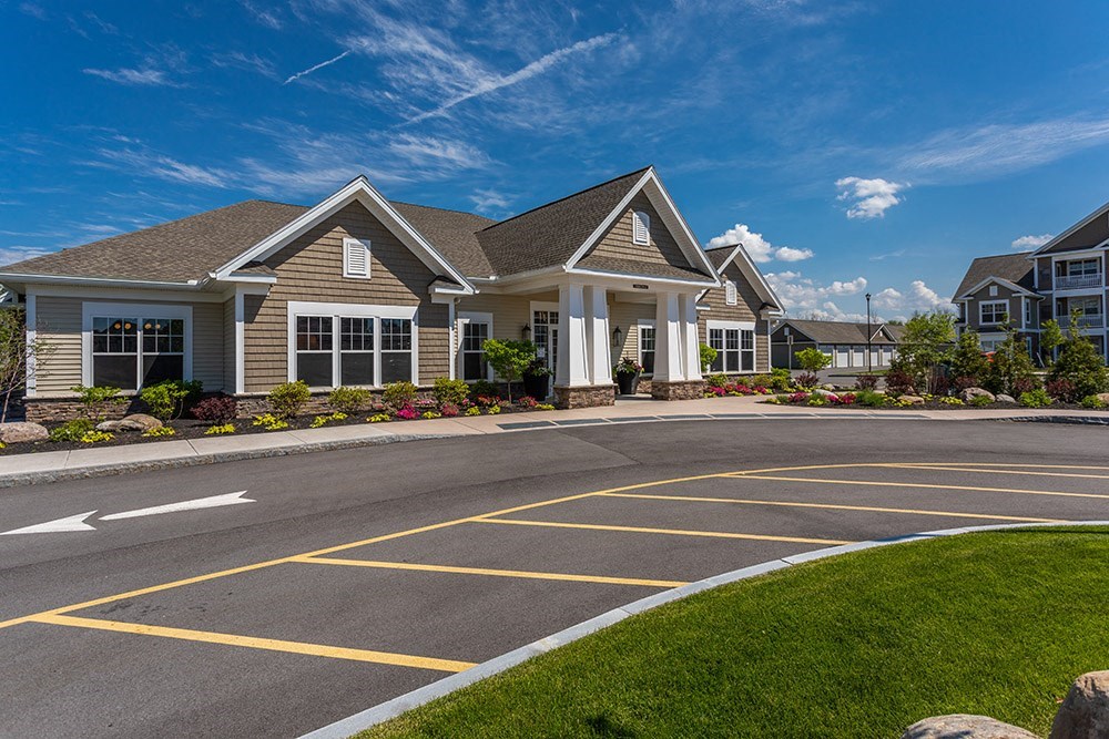 a large house with a street in front of it