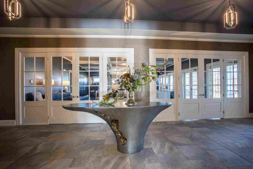 a large room with a table in the middle