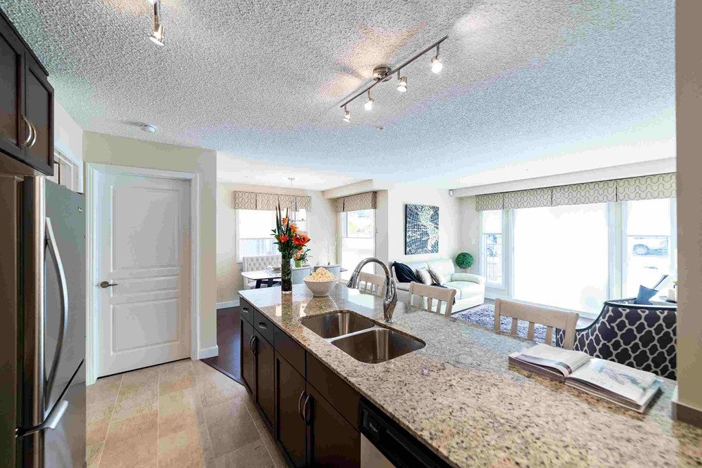 a kitchen with a sink and a counter top