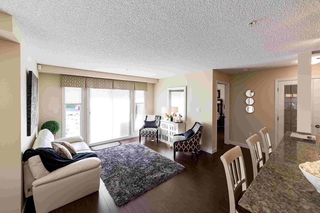 a view of the living room and dining room from the kitchen