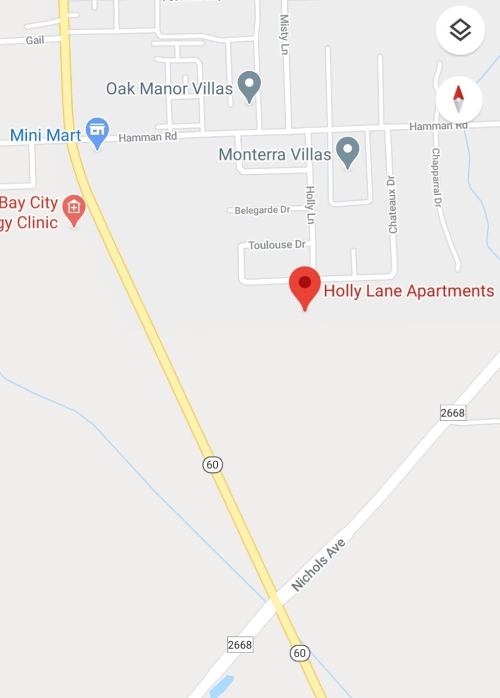 A map shows the location of Holly Lane Apartments in relation to nearby streets and other points of interest.