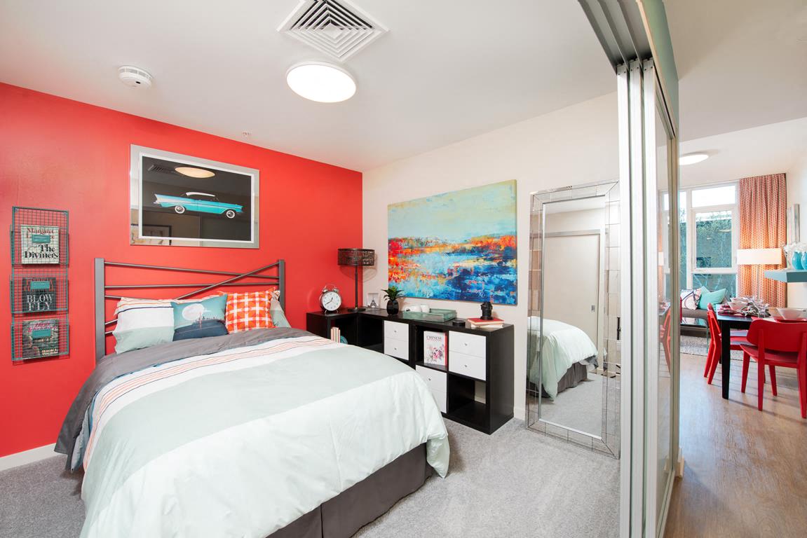 One Bedroom Apartments in Downtown San Jose, CA - One South Market Bedroom with Carpet Flooring and Modern Lighting