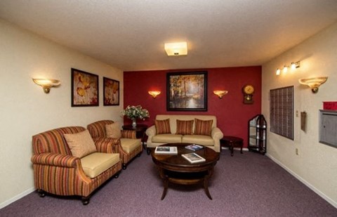 a living room with couches and a table