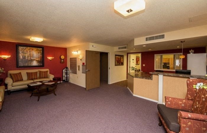 a living room with a couch and a table