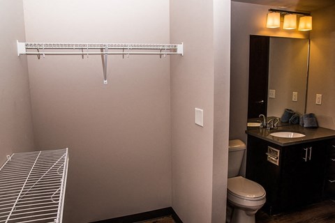 a bathroom with a shower toilet and a sink