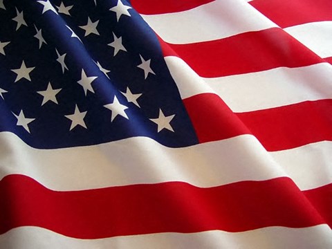 a large flag waving in the air