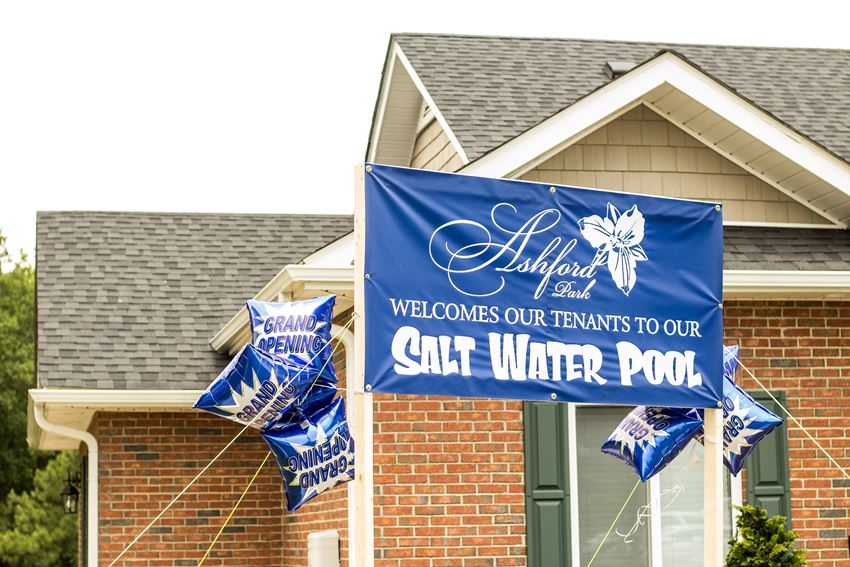 a sign in front of a house that says salt water pool welcomes our tenants to