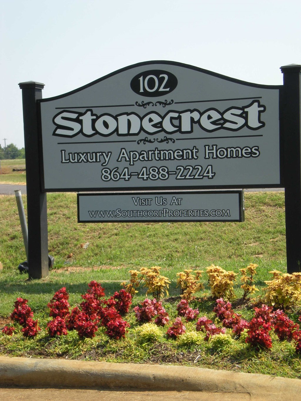 a sign for the storecrest luxury apartment homes