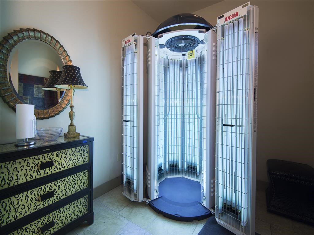 a shower in a room with a glass door