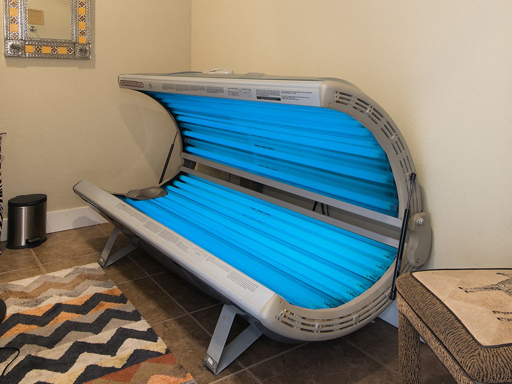 a patient bed in a room with a pool