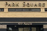 a building with a park square sign on it