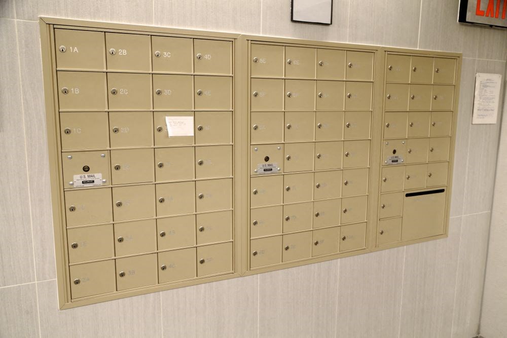 a wall of lockers on the wall of a room