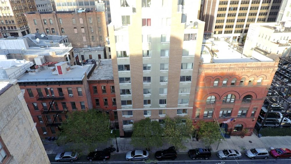 a view of the city from a skyscraper