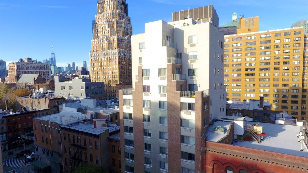 a view of the city from the roof of a building