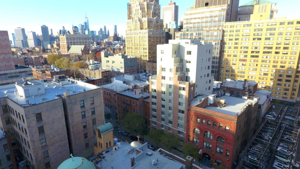 a view of the city from the roof of a building