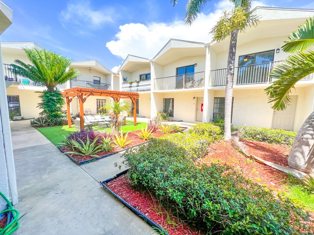 a building with a garden in front of it