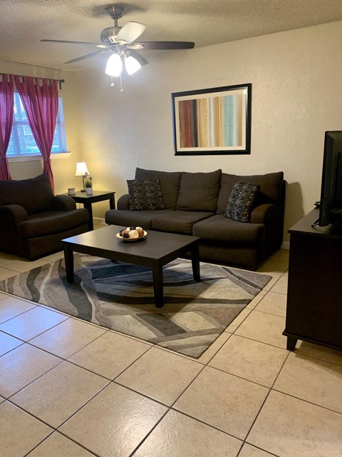 a living room with a couch and a coffee table