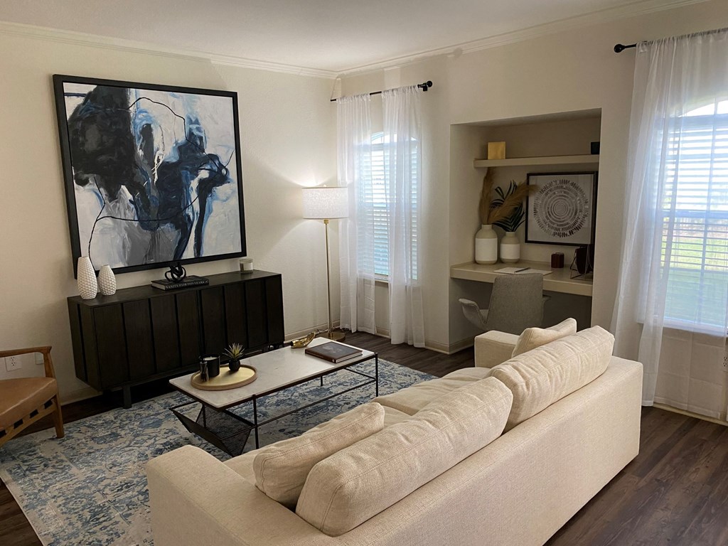 a living room with a couch and a coffee table