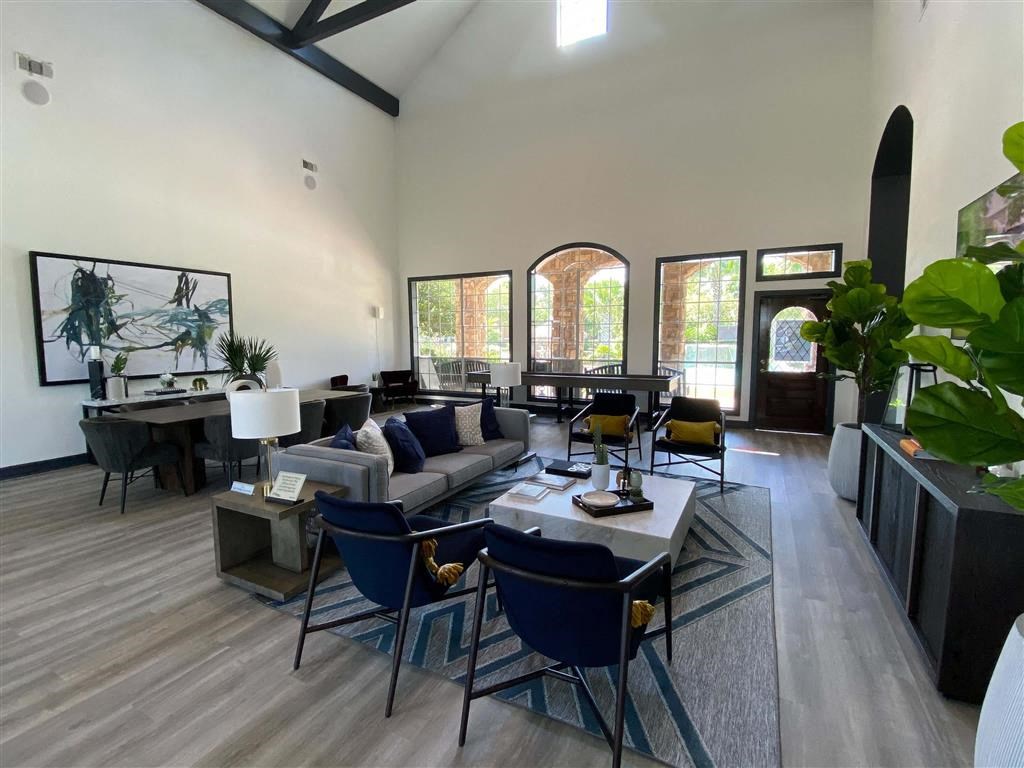 a living room with a couch and a table