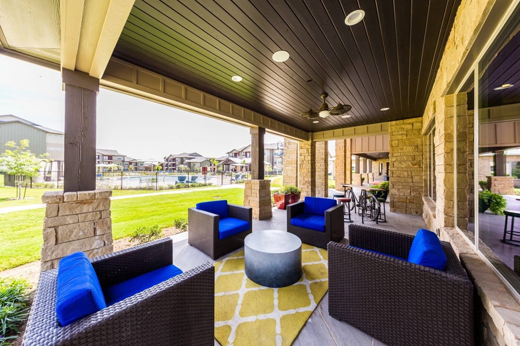 Clubhouse Outdoor Seating Area Overlooking Pool Area at Legacy Creekside Apartments, San Antonio, 78251