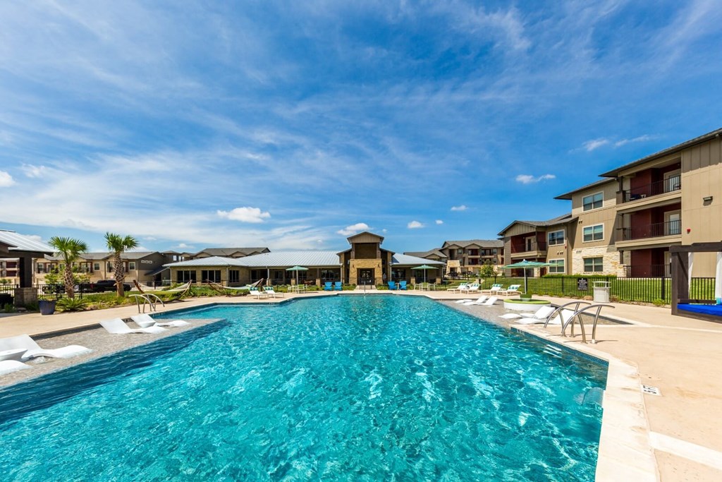 Stunning Pool Area with Tables, Lounge Chairs and BBQ Area at Legacy Creekside Apartments, San Antonio, 78251