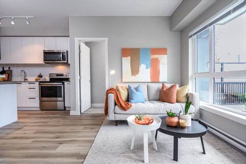 a living room with a couch and a table