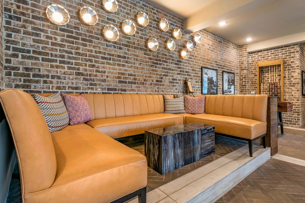 Resident Lounge area couch at JTB Apartments, Florida