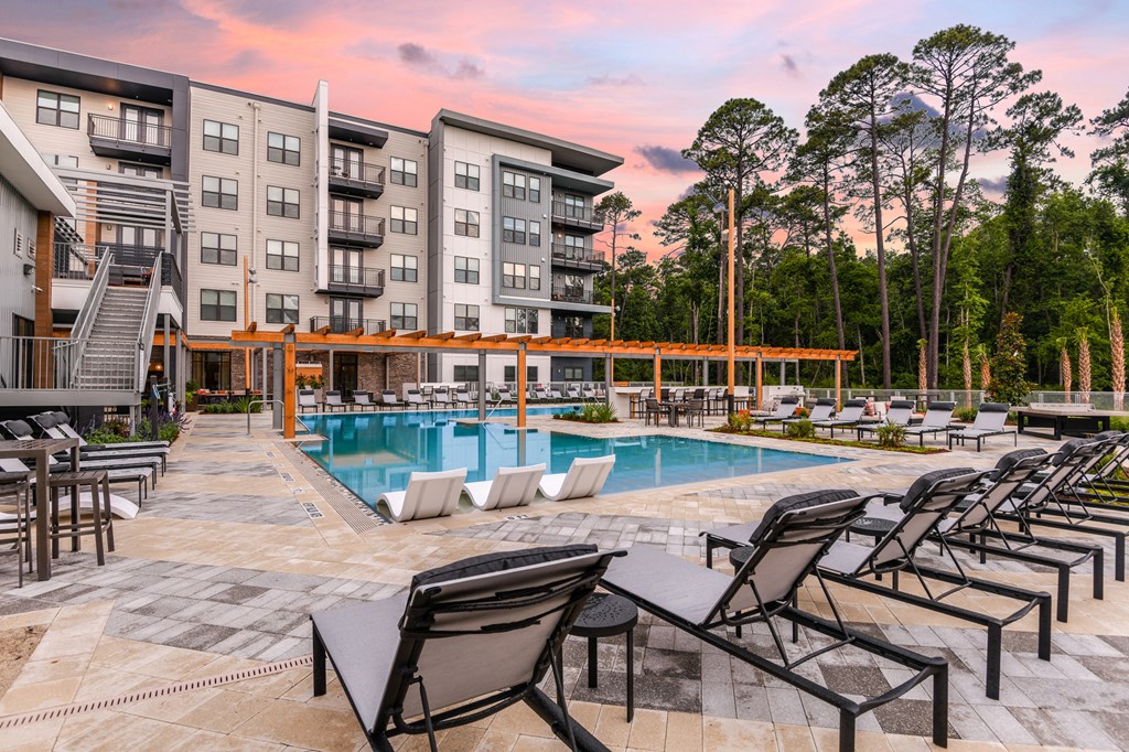 Twilight view of pool at JTB Apartments, Jacksonville