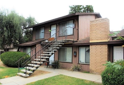 A house with a staircase leading to the second floor.