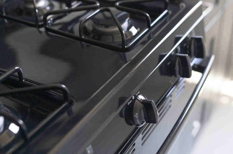 a black stove top oven in a kitchen