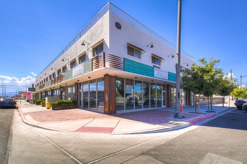 a building on the corner of a city street