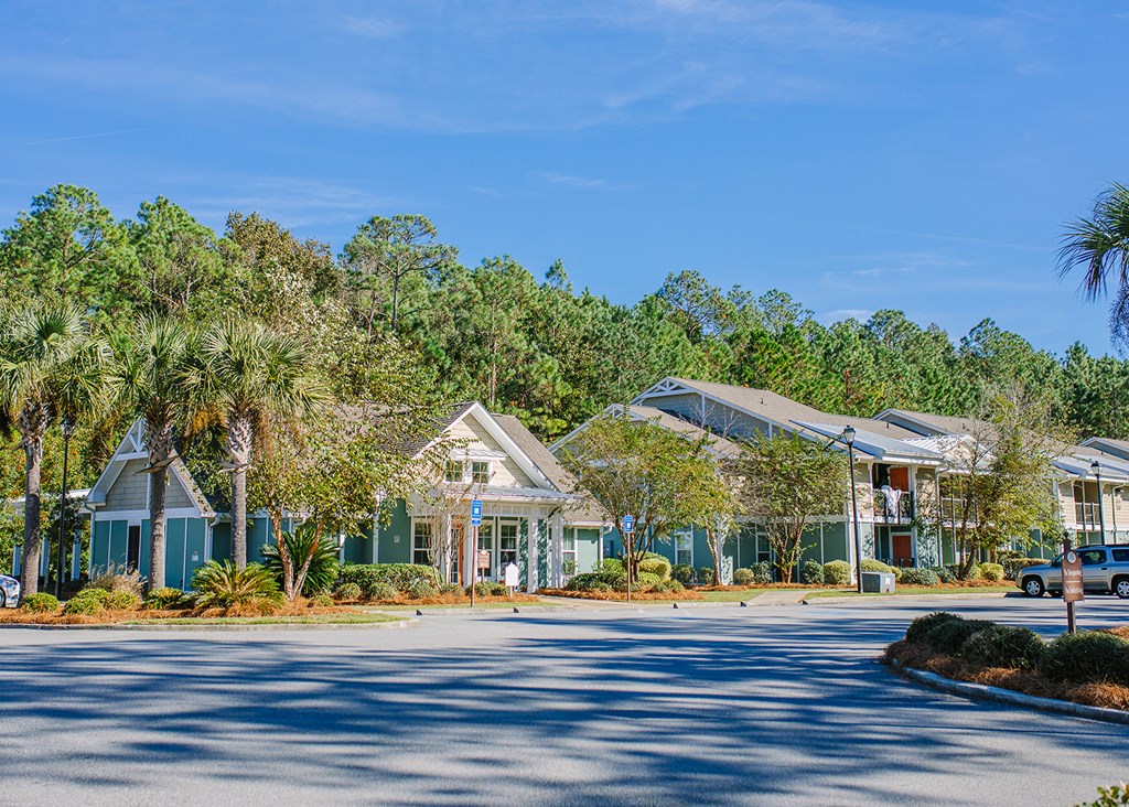 a row of houses on the side of a street