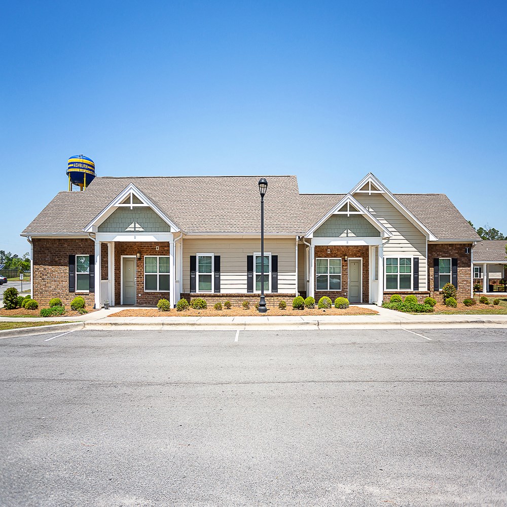 an image of a house with a parking lot