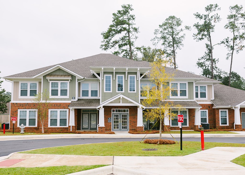 a large house on the corner of a street