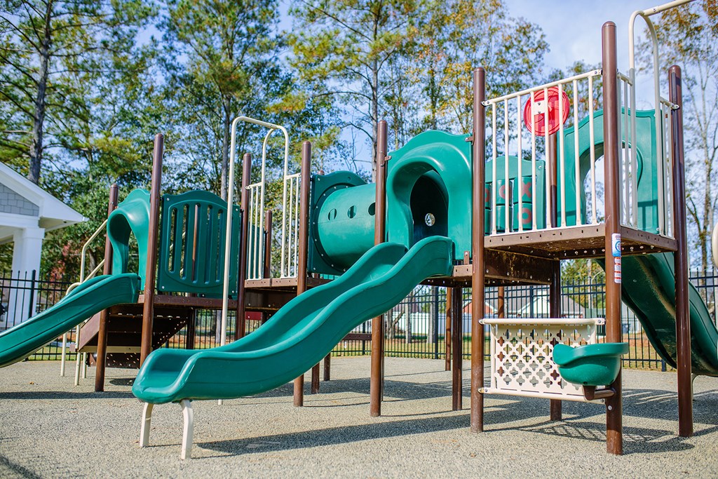 a playground with slides at a park