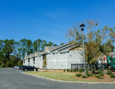 a building with cars parked in front of it
