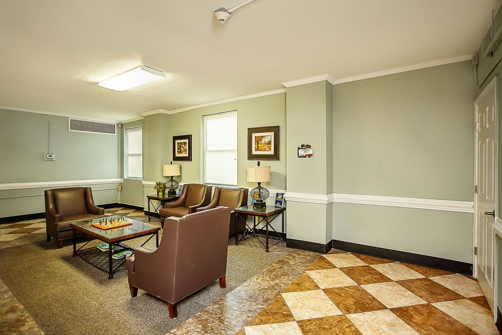 a living room with couches and a table