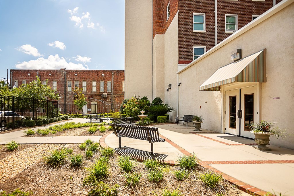 the preserve at cardinal courts courtyard with bench and building