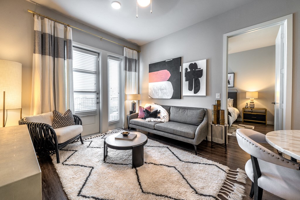 a living room with a couch and a table